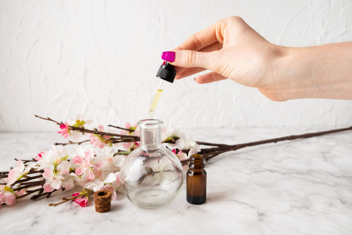 A bottle of Karma Naturals Organic Nail Polish Remover with eco-friendly packaging.